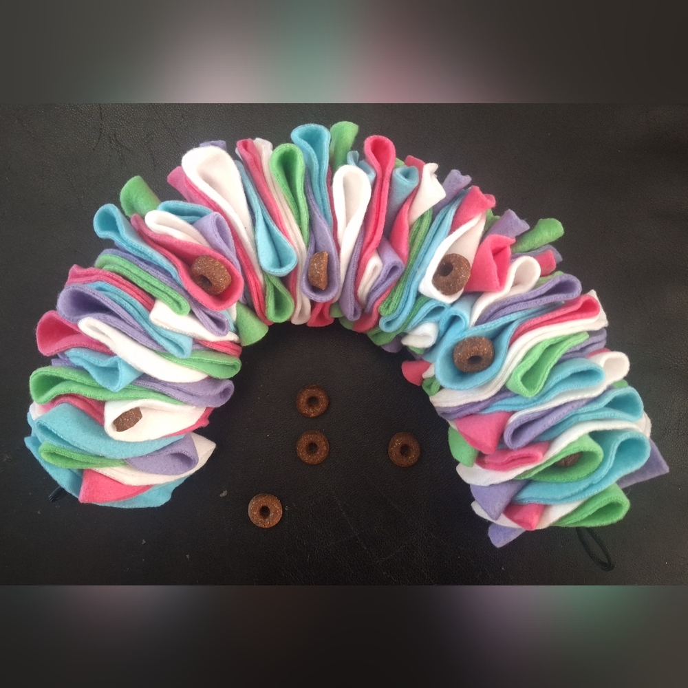 Snuffle rope, treat dispenser, enrichment puzzle